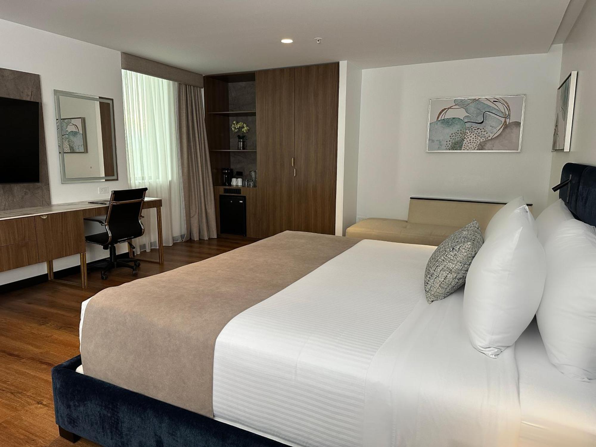 Wyndham Quito Airport Hotel Puembo Exterior foto A room at the hotel